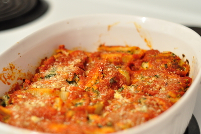 Stuffed pasta shells still in the baking dish