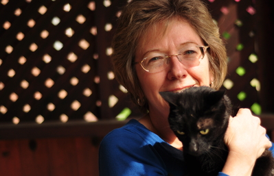 My mom with Angus on the front porch