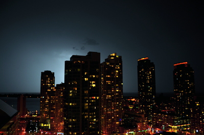 Lightning behind the buildings