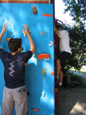 Side view of rock climbing