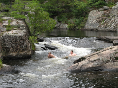 Sliding down some rapids, lots of sharp rocks below the water, but my watershoes took care of my feet