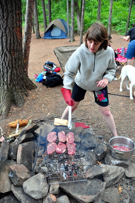 Laura cooking up some steaks