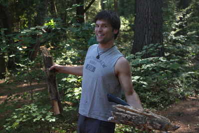 Kurtis posing with his wood and his axe
