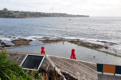 The fake pool at Coogee, with one man braving the blue bottles
