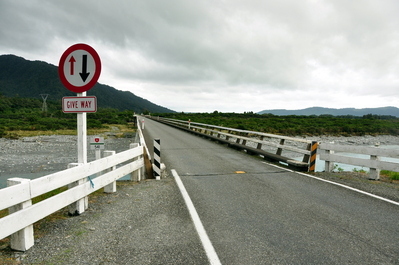 Cars entering on this side must yield to on the other side, there were bridges like this everywhere and sometimes they were so long you could not see the other end