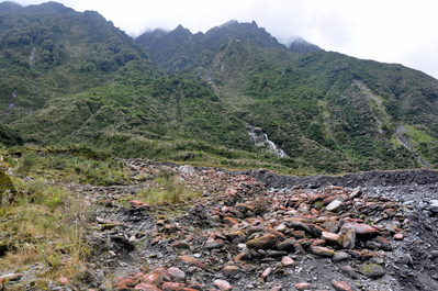 Rocks and mountains and waterfalls and clouds