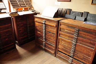 Type cabinets at the print shop (these were all full and there were a dozen more)