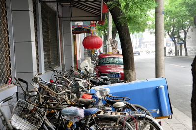 Bikes and old car on my hostel street