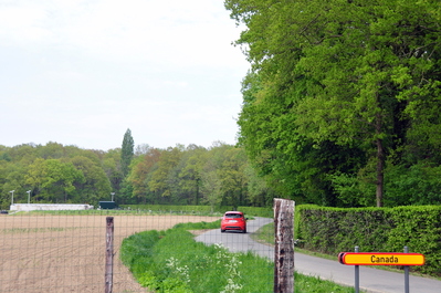 Looking away from the pub, notice the width of the road compared to that very small car. It's a two way street.