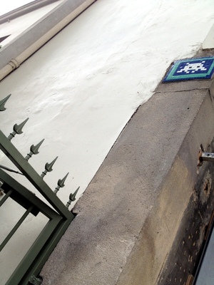 Space invaders graffiti near the chocolate shop