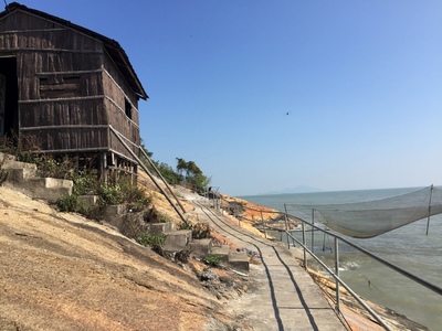 Near the restaurant, fishing net and coastline