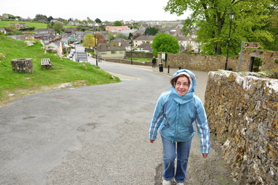 Kim walking up the tall hill to the Rock of Cashel