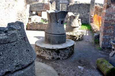 Mills for grinding grains