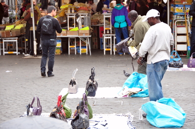 Fake purse dude in produce market