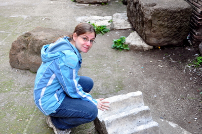 Kim touching ancient marble outside the Pantheon