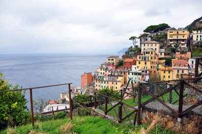 Partial view of Riomaggiore, the sea and the front yard of a home