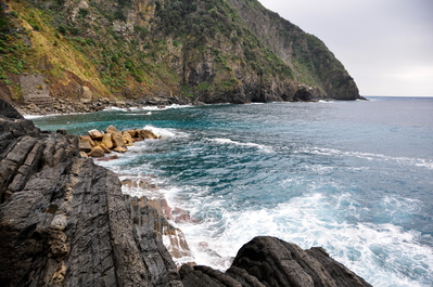 Pretty blue crashing surf