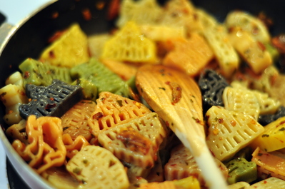 Cooked Italy pasta shapes with spices from Riomaggiore
