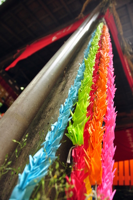 Many paper cranes at a sub-shrine