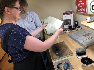 Sarah doing one of the first steps of her print, directed by David Bull