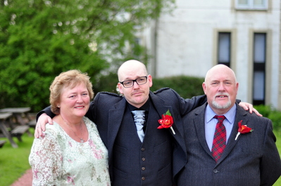 Lee and his parents