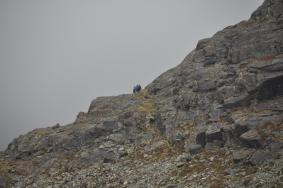 People part way up the actual mountain
