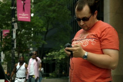 Patrick preparing the GPS in downtown Toronto