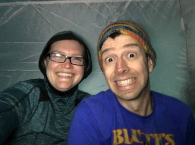 Hiding from the rain in our tent